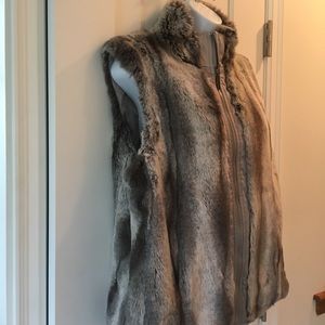 Unique reversible plush fur/satin vest; like new.